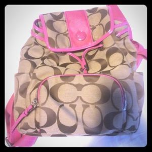 Super cute Coach back pack purse. 💓