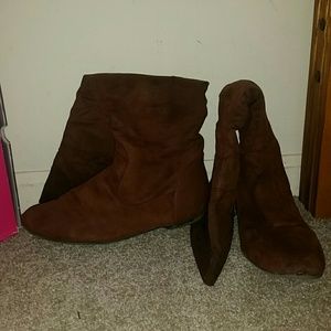 Brown sued boots