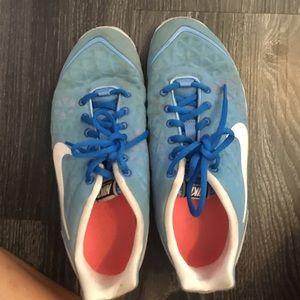 Blue Nike running shoes