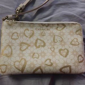 Lightly used Coach Wristlet.