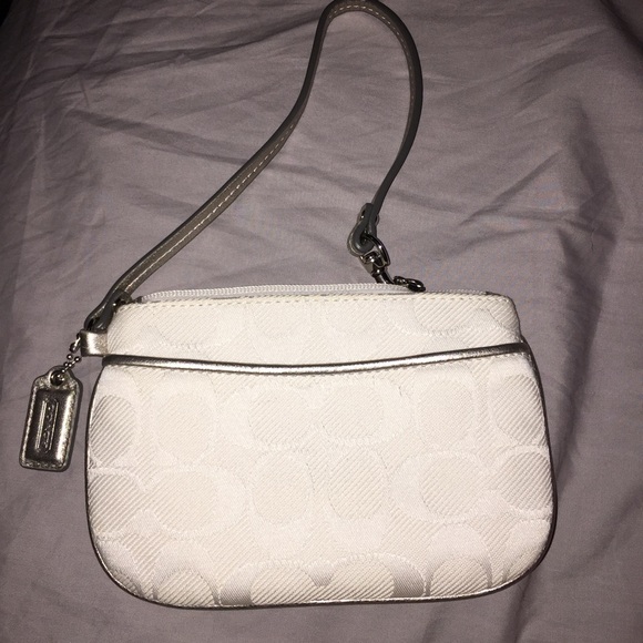 Lightly used Coach Wristlet.
