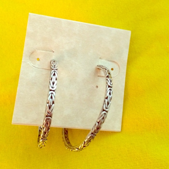 Lois Hill hoop sterling silver earrings.
