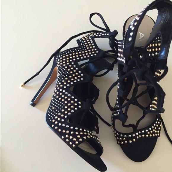 Aldo lace up studded heels.