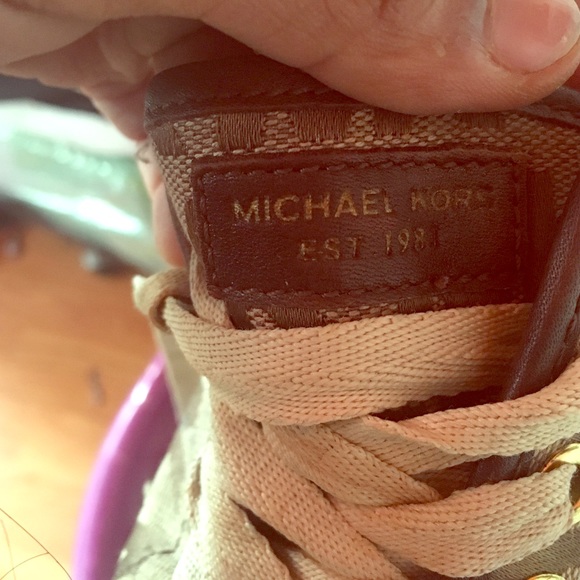 Worn MichaelKor sneakers comes with box