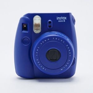 Fuji max camera in indigo. Polaroids.