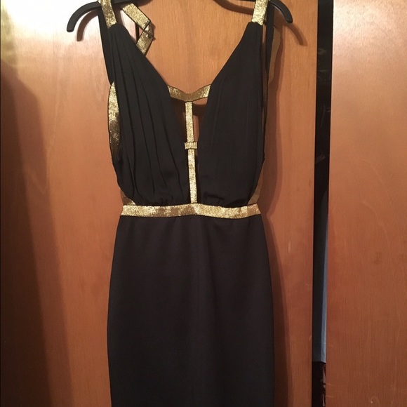 Black & Gold sleeveless dress.
