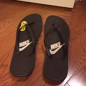 Women's Nike Solarsoft Flip Flops- brown