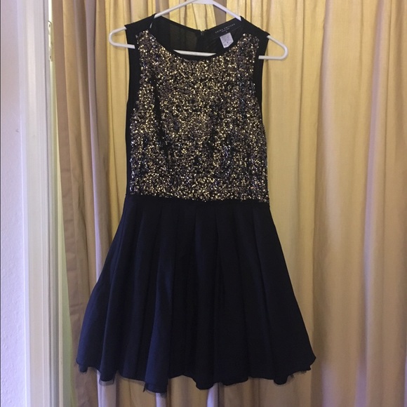 Akira gold sparkly baby doll dress