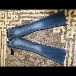 Calvin Klein light wash jeans. Boot cut. Size 27 L