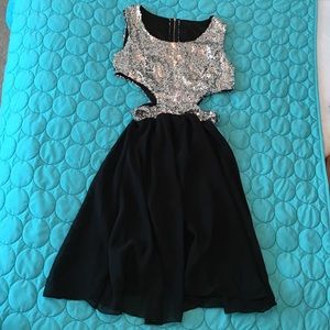 Sequence dress with side cut outs