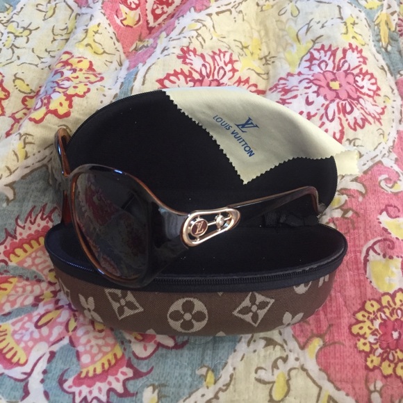Louis Vuitton 8313 60 sunglasses.