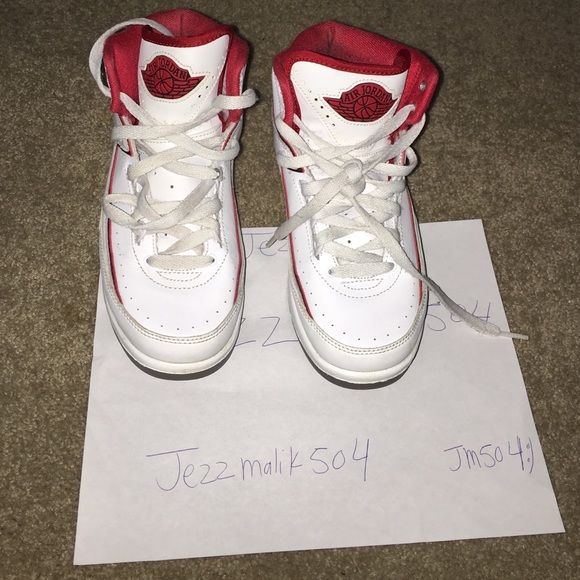 Varsity red Jordan 2s