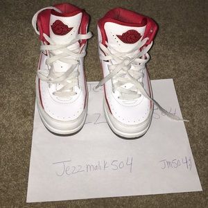 Varsity red Jordan 2s