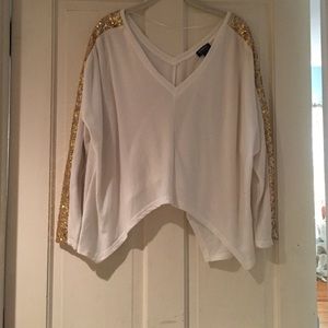 White sweater with gold sequin sleeves