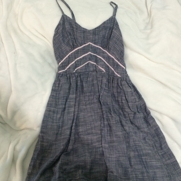 Grey dress, with white/pink design. Worn once