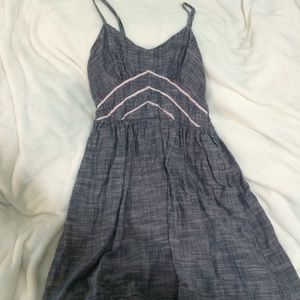 Grey dress, with white/pink design. Worn once