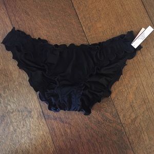 Black ruffle cheeky bottoms VS