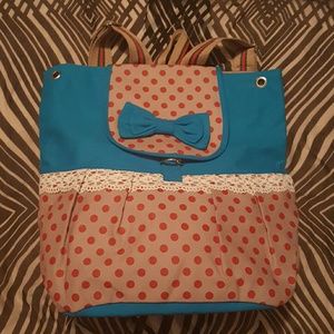 Adorable blue and polkadot backpack with with lace