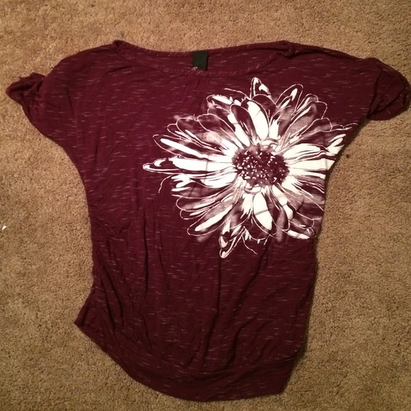 Red blouse. With flower