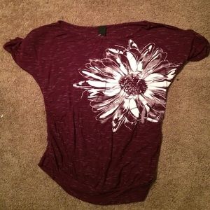 Red blouse. With flower