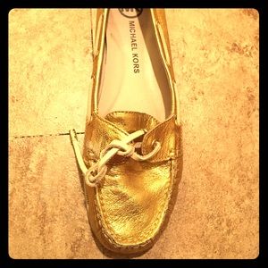 Michael Kors gold boat shoes