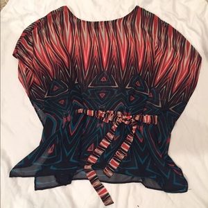Etiquette brand tunic top