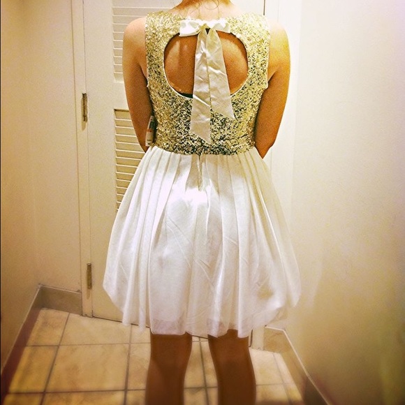 off white and gold-sequined party dress