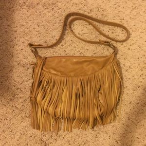 Tan cross body bag