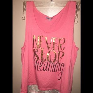 Pink tee lower back has see thru lace