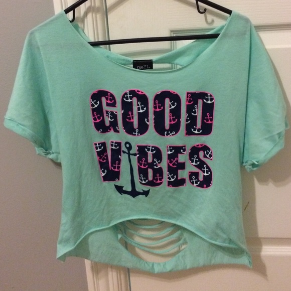 A blue "GOOD VIBES" shirt.