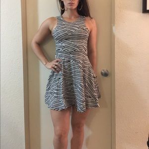 Black and white print peplum style dress