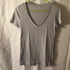 Gray v neck tee.