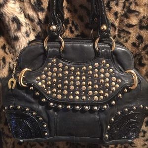 Betsey Johnson black leather guns n rosettes bag