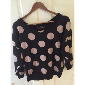 Mid length black and pink polka dot shirt