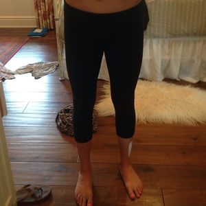 Black lulu lemon pants with zipper down the calf