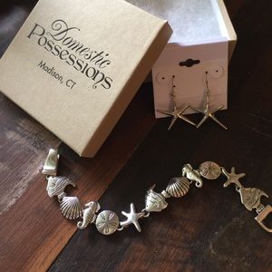 Silver shell bracelet and earrings