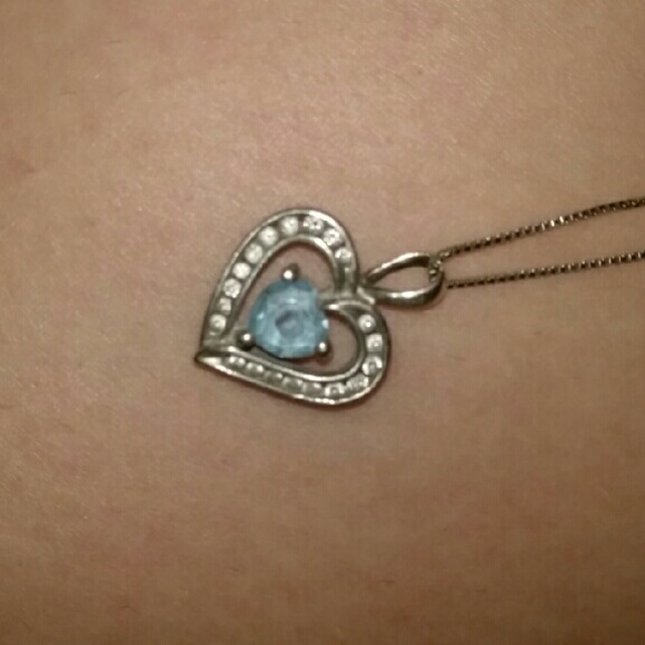 Blue gemstone with chain and heart