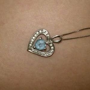 Blue gemstone with chain and heart