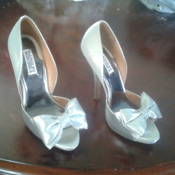 A nice pair of Badgley Mischka  silver shoes.