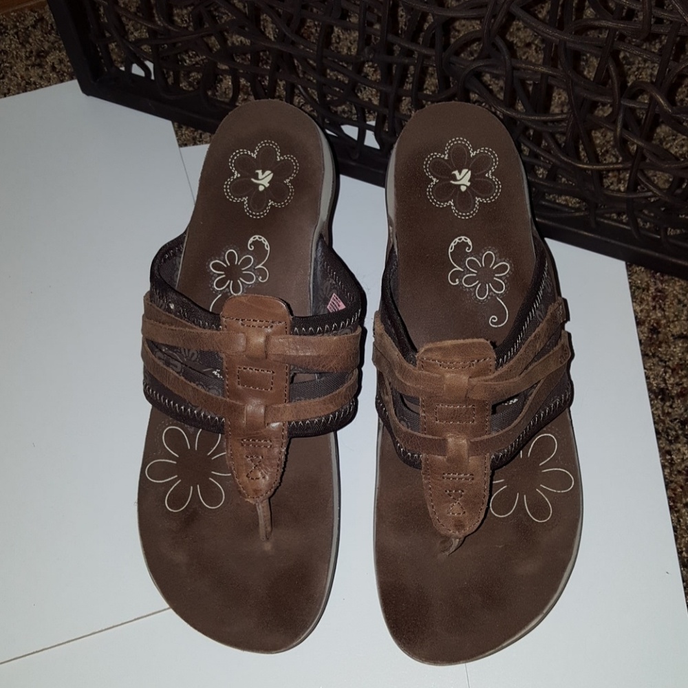 Cushe sandals. You can walk all day in these shoes