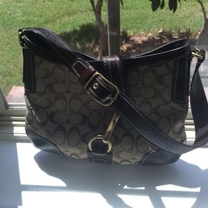 Coach saddle purse. Willing to lower price.