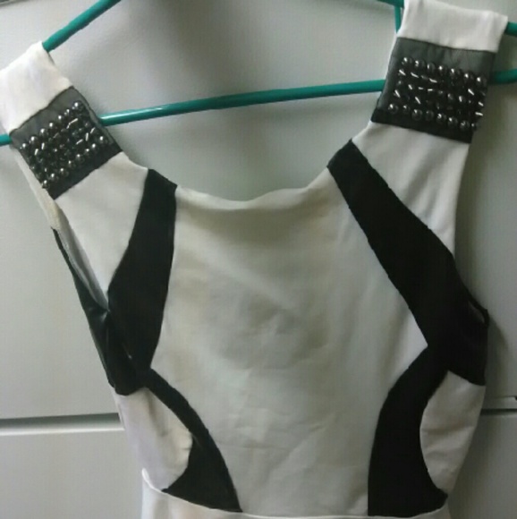 A BEBE ruffle bottom tank top