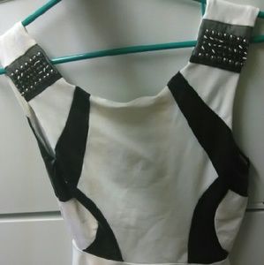 A BEBE ruffle bottom tank top
