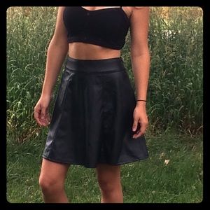 A cute black, leather mini skirt
