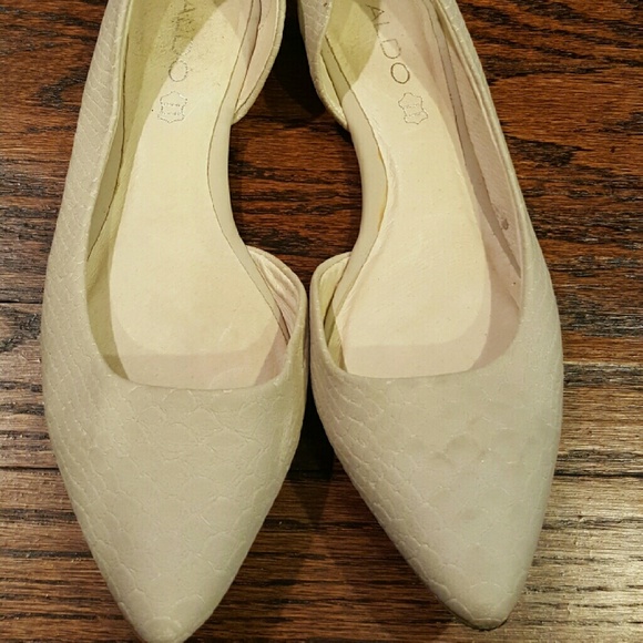 Beige Aldo flats in good condition
