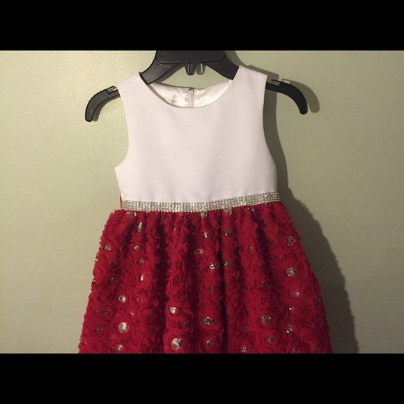 A red and white sequin kids dress worn once