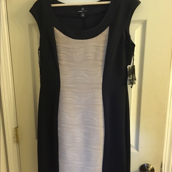 Cap sleeve black and nude dress size 12