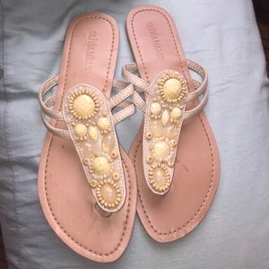 Tan sandals with yellow beads