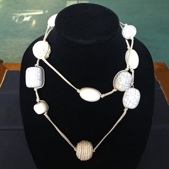 Natural jute, wood and bead necklace.