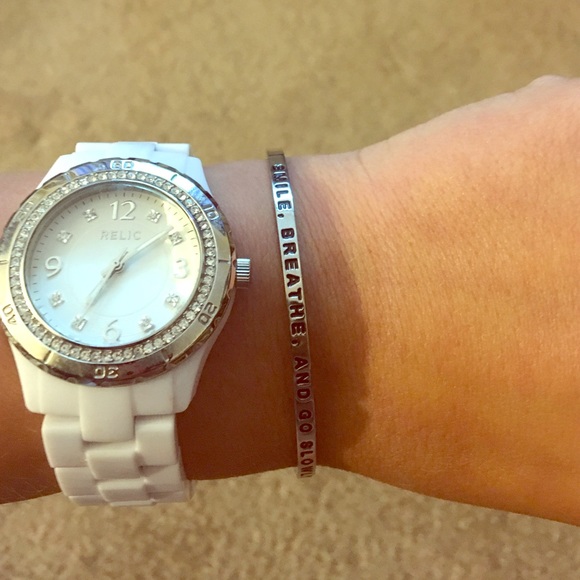 Mantra band! Reads "Smile. Breathe. And Go Slowly"